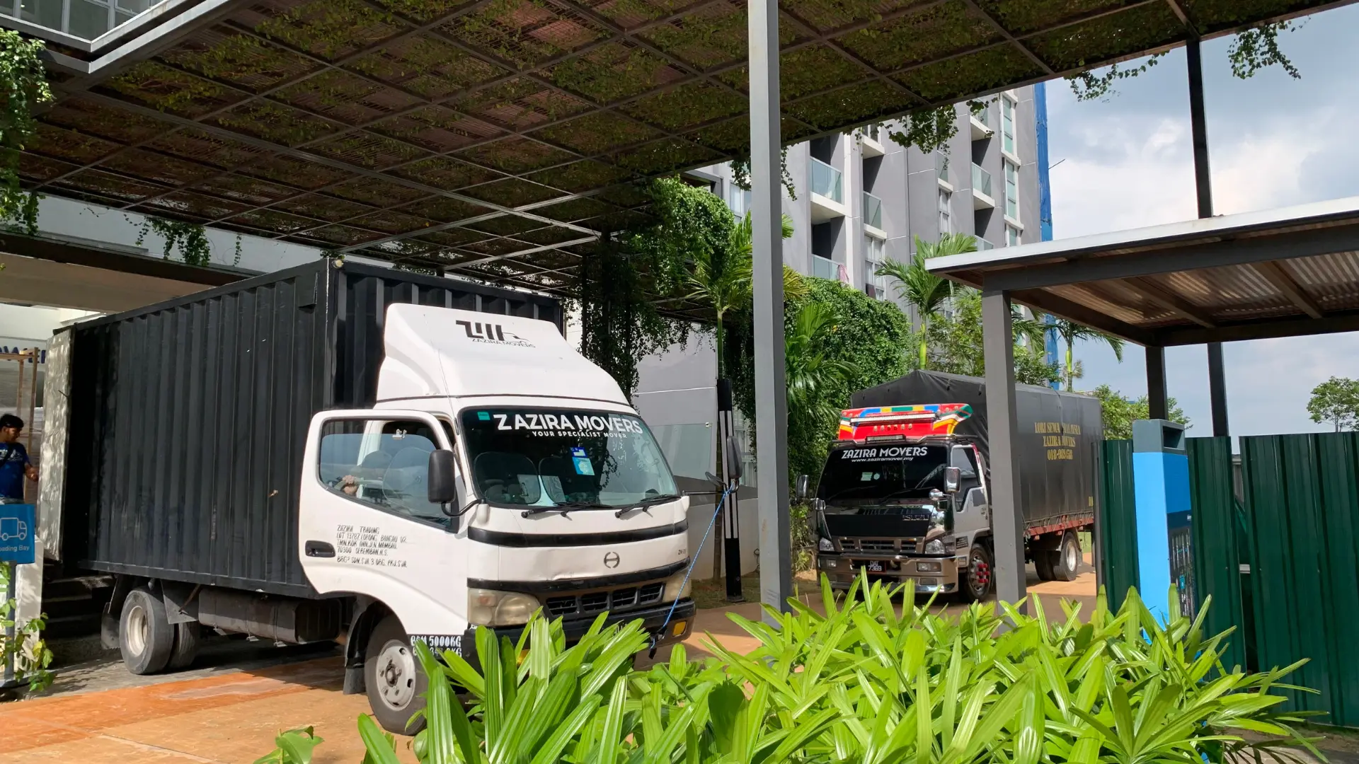 Logistics & Transport 2 Logistics transport service loading business stock into a lorry in Malaysia