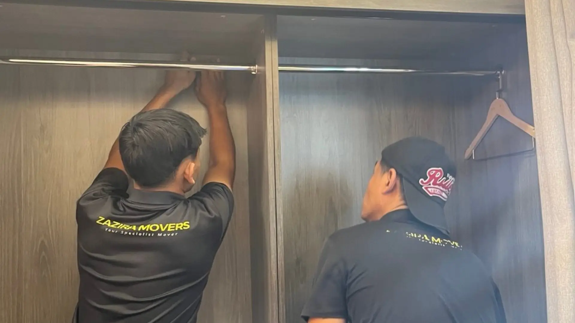 Zazira Movers crew dismantling and reassembling furniture for a home move in Malaysia