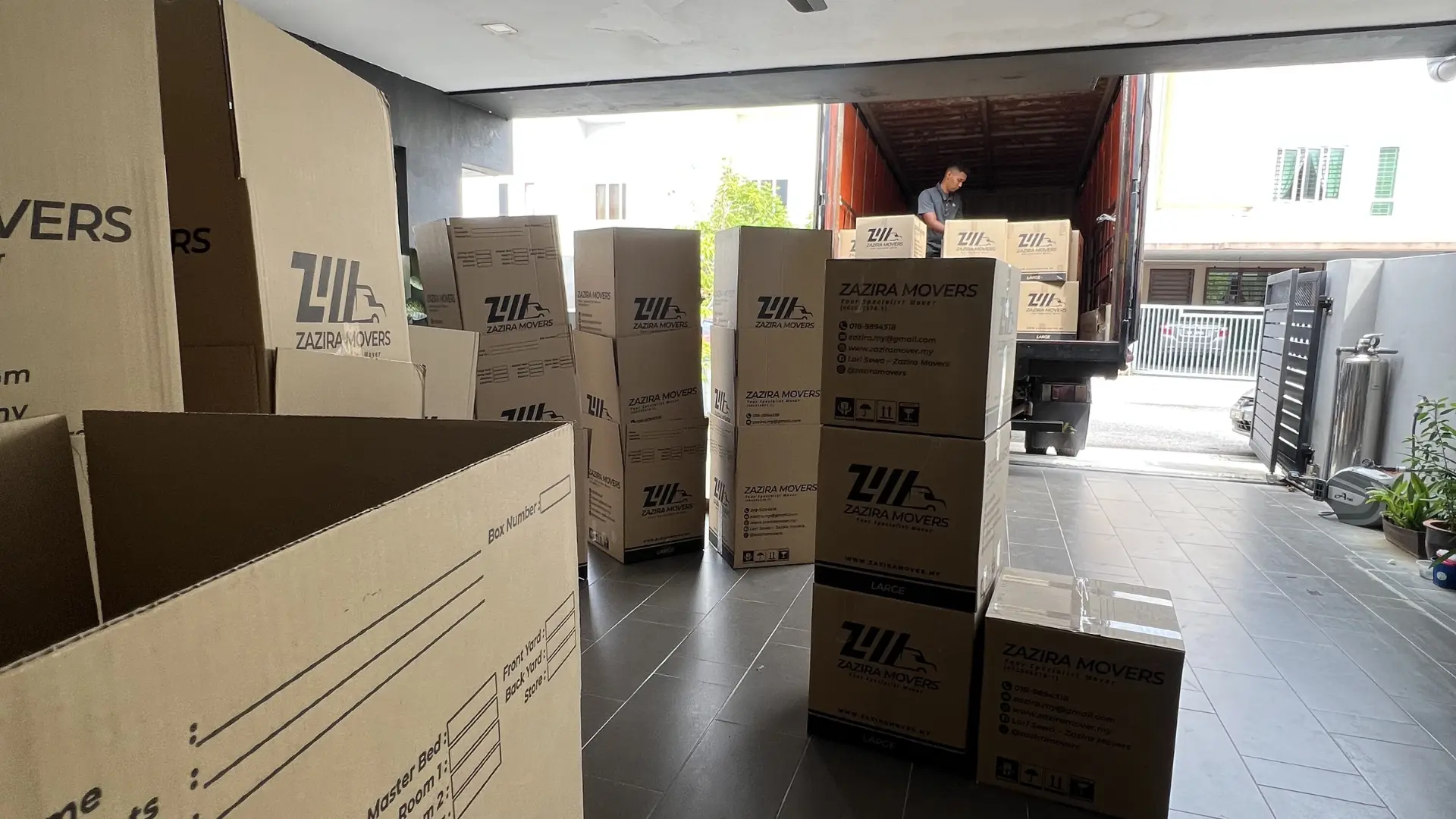 Storage Services 7 Zazira Movers packing service for a house move in Malaysia